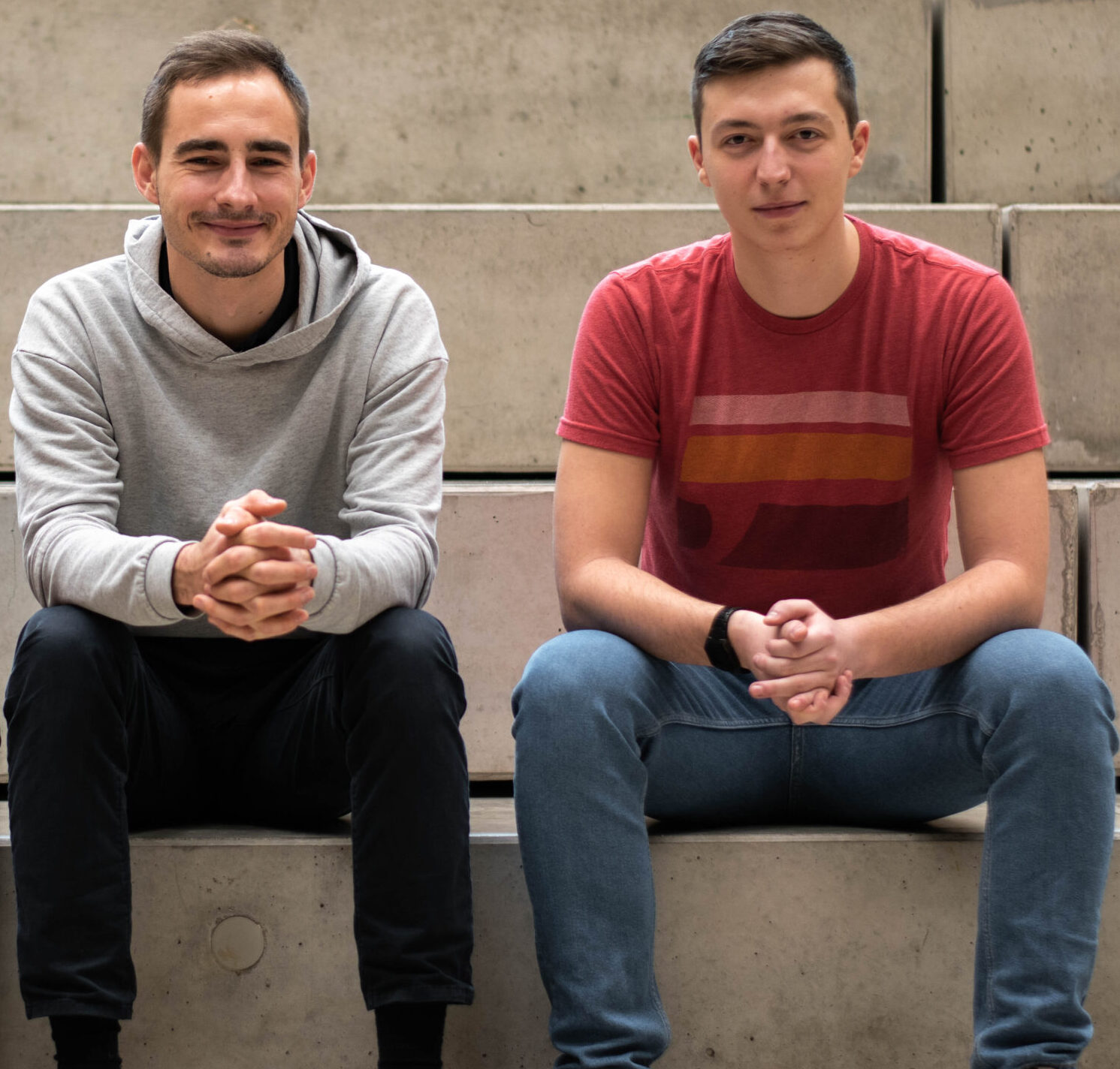 Ben and Marko sitting on Stairs at the Munich Urban Colab